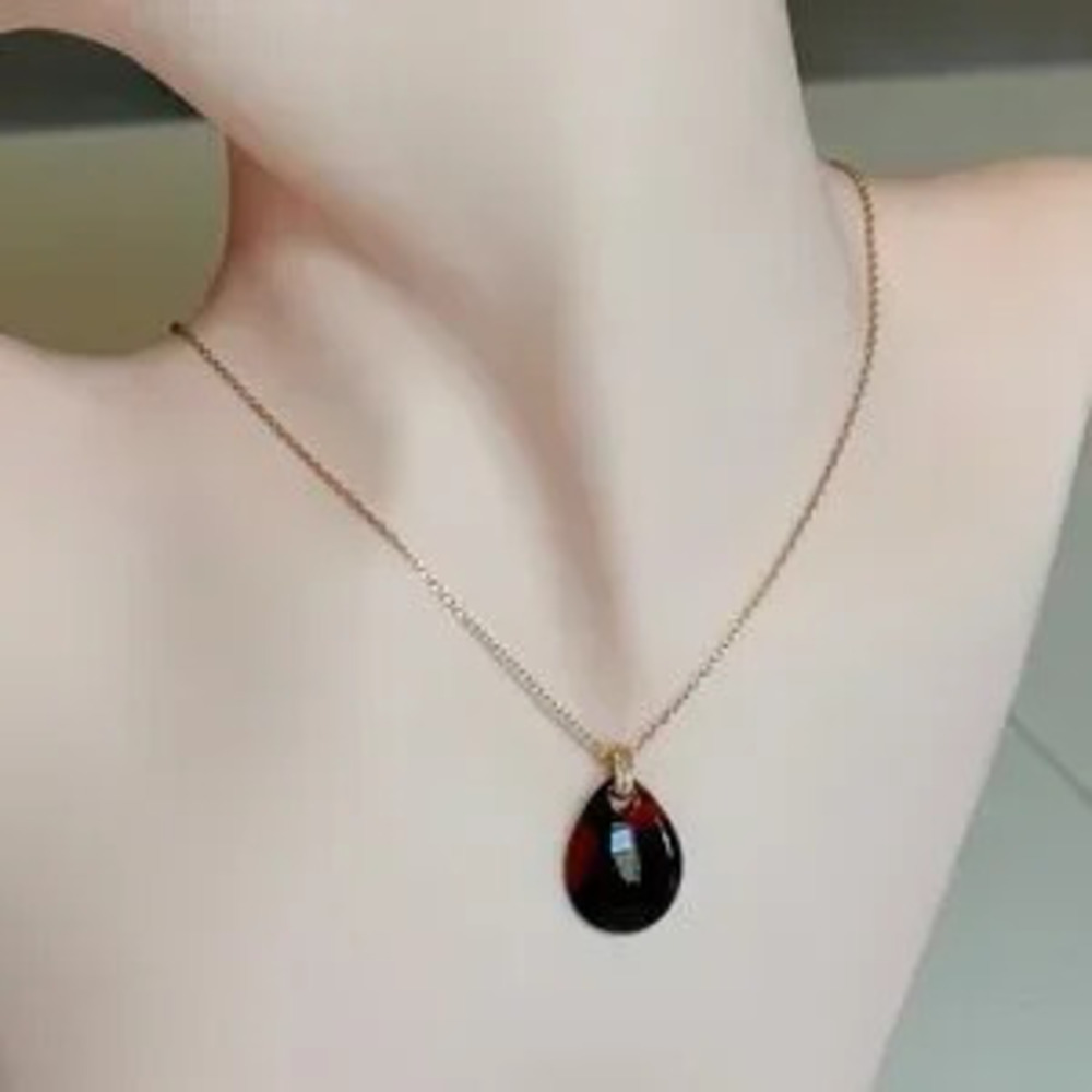 Gold Chain Necklace with Black Teardrop Pendant